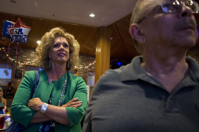 Nevada Republican National Committeewoman and Assembly candidate Diana Orrock watches results come in during a watch party at Old School Brewing Company in Las Vegas on June 14, 2016. (Bridget Ben ...