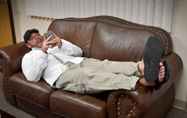 Nevada Assembly Majority Leader Paul Anderson checks election returns on his mobile device during a watch party at his office Tuesday, June 14, 2016, in Las Vegas. David Becker/Las Vegas Review-Jo ...