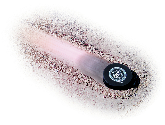 Hockey puck sliding - illustration (Gabriel Utasi/Las Vegas Review-Journal)