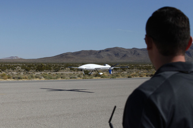 Sandstorm, an experimental unmanned aircraft system manufactured by Unmanned Systems, Inc., is piloted in for a landing by Michael Toland of National Securities Technologies at the Desert Rock Air ...