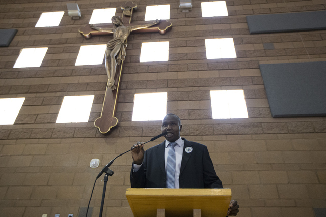 Biar Atem, who came to the United States as a refugee in 2001 from what is now South Sudan, shares his story during a Catholic Charities World Refugee Day fair at Our Lady of Las Vegas Roman Catho ...