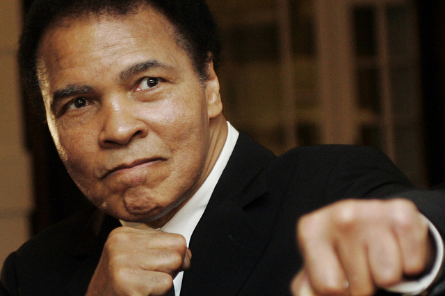 U.S. boxing great Muhammad Ali poses during the Crystal Award ceremony at the World Economic Forum (WEF) in Davos, Switzerland January 28, 2006. (REUTERS/Andreas Meier)