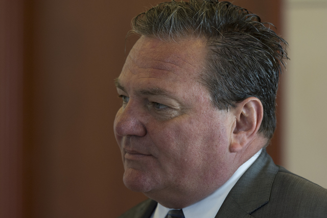 Louis C. Schneider, attorney for Desert Pines High School teacher Jonathan Scheaffer, speaks with a reporter following Scheaffer's court appearance at the Regional Justice Center in Las Vegas Mond ...