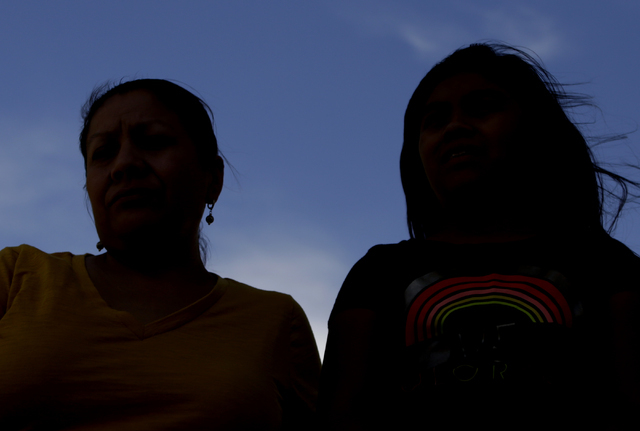 Francisca Sanchez, 41, left, and her daughter Karla Ortiz, 11, who don't want to show their face, are photographed during an interview at Nellis Meadows Park on Thursday, June 9, 2016, in Las Vega ...