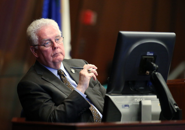 Nevada Assembly Speaker John Hambrick, R-Las Vegas, listens to Assembly floor discussion of the proposed live entertainment tax in the final hours of the session at the Legislative Building in Car ...