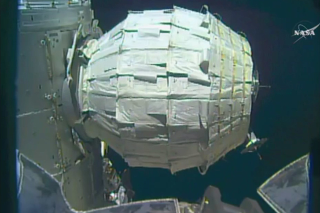 This image made from video provided by NASA shows the inflation of a new experimental room at the International Space Station on Saturday, May 28, 2016. (NASA via AP)