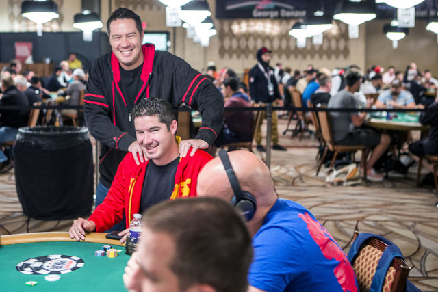 Grant Hinkle stands beside his brother Blair while he  plays $1,500 6-handed No-limit Hold 'em tournament at Rio Convention Center, 3700 W. Flamingo Rd., on Wednesday, June 8, 2016. (Jeff Scheid/L ...