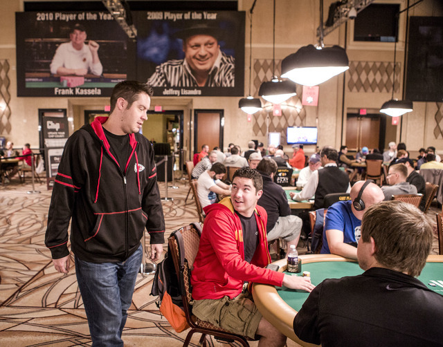 Grant Hinkle, left, talks to his brother Blair while he plays $1,500 6-handed No-limit Hold 'em tournament at Rio Convention Center, 3700 W. Flamingo Rd., on Wednesday, June 8, 2016. (Jeff Scheid/ ...