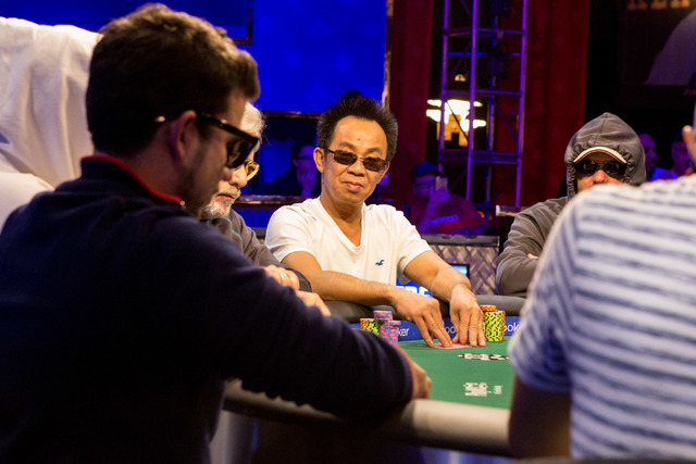 David Pham, center, plays in the final nine in the World Series of Poker "Monster Stack" event at the Rio Convention Center in Las Vegas on Tuesday, June 28, 2016. (Elizabeth Brumley/Las Vegas Rev ...