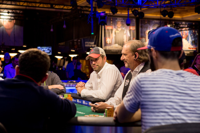 Mitchell Towner, center in white shirt, plays in the final nine in the World Series of Poker "Monster Stack" event at the Rio Convention Center in Las Vegas on Tuesday, June 28, 2016. (Elizabeth B ...