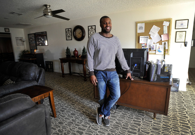 Foster parent Jamaal Moore stands in his recently remodeled residence at the St. Jude's Ranch for Children in Boulder City on Friday, Feb. 6, 2015. Moore cares for four foster children at one of t ...
