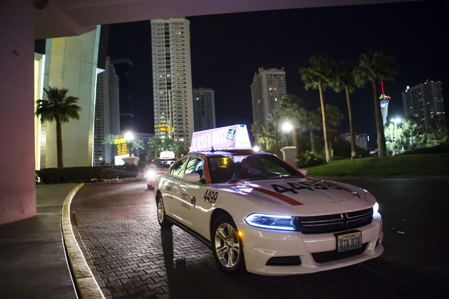 Desert Cab taxi driver Andrew Gnatovich lines up to pick up passengers at the Westgate hotel-casino in Las Vegas on Wednesday, May 4, 2016. (Chase Stevens/Las Vegas Review-Journal) Follow @cssteve ...