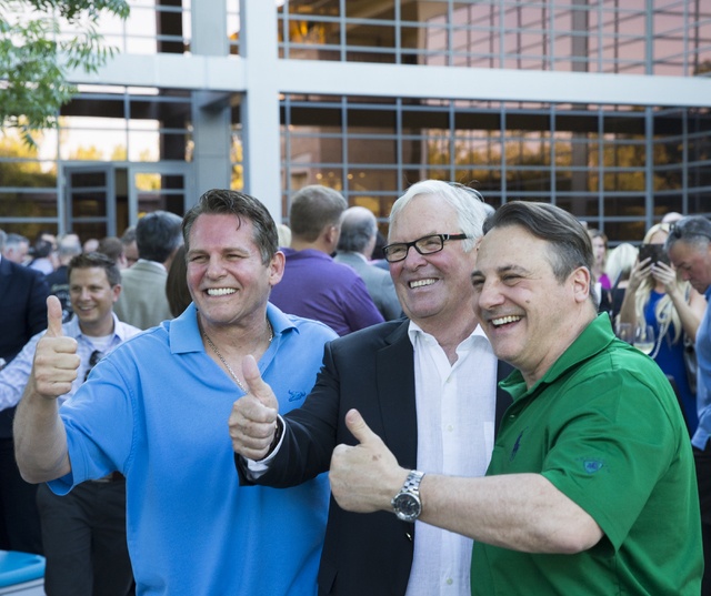 Joe Maloof, from left, Bill Foley and Gavin Maloof, pose for a photo at a party to celebrate Las Vegas' new NHL expansion team, June 23, 2016, in Las Vegas. Foley teamed with the Maloof family to  ...