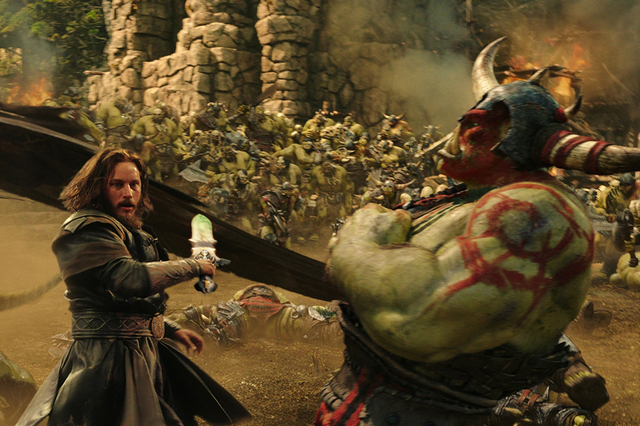 Commander Anduin Lothar (TRAVIS FIMMEL) defends himself against an orc from The Horde in "Warcraft." From Legendary Pictures and Universal Pictures comes"Warcraft." Photo Credit: Legendary Picture ...
