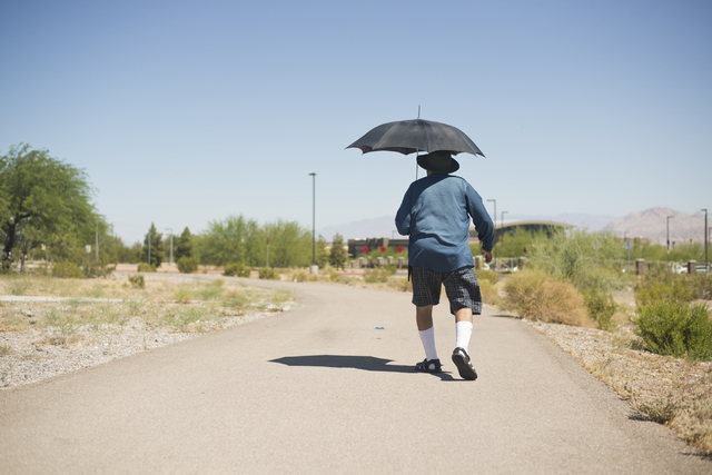 Joe Olmeda takes his daily walk along Boulder Highway in Henderson on Friday, June 17, 2016. Alameda says he tries to take a walk every day, but doesn't when it gets too hot. (Daniel Clark/Las Veg ...