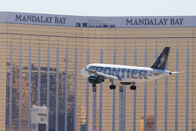 A Frontier Airlines flight passes in front of the Mandalay Bay hotel-casino on approach to McCarran International Airport on Friday, June 3, 2016 in Las Vegas. (Brett Le Blanc/Las Vegas Review-Jou ...