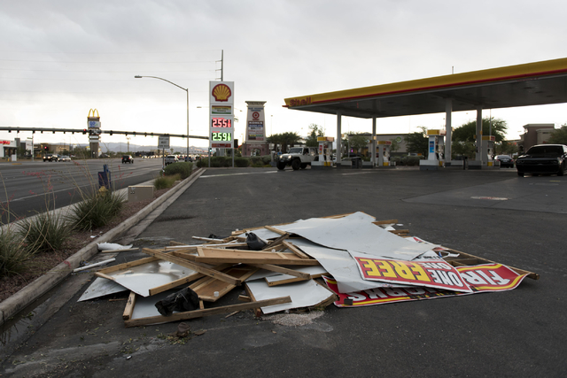 Debris from a fireworks stand which collapsed due to the storm sits in the Shell gasoline station parking lot on Blue Diamond Road at Valley View Boulevard in Las Vegas Thursday, June 30, 2016. Ja ...