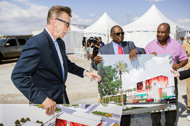 Architect Edward Vance, left, discusses the proposed new Moulin Rouge Las Vegas while Gene Collins, center, vice president of Moulin Rouge Holdings and Scott Johnson, president of Moulin Rouge Hol ...