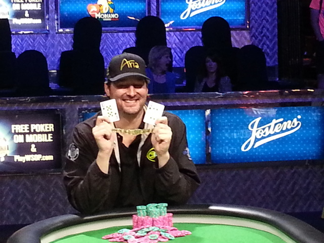 Phil Hellmuth poses with the 10 and 4 of spades to represent his 14th career World Series of Poker bracelet. Hellmuth won the $10,000 buy-in Razz Championship late Monday at the Rio Convention Cen ...