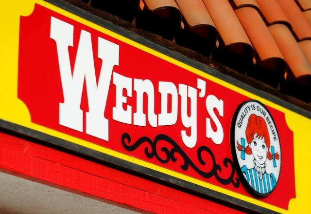 A Wendy's sign and logo are shown at one of the company's restaurant in Encinitas, California May 10, 2016 .  (Mike Blake/Reuters)