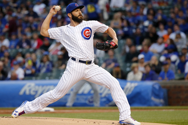 In this May file photo, Chicago Cubs starting pitcher Jake Arrieta delivers during a baseball game against the Los Angeles Dodgers in Chicago. (Charles Rex Arbogast/Associated Press)