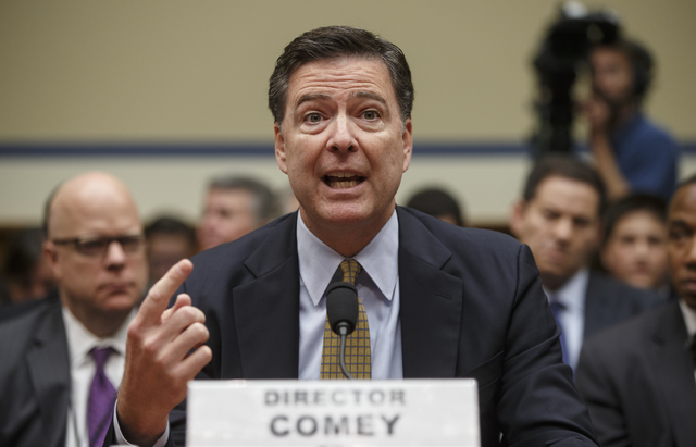 FBI Director James Comey testifies on Capitol Hill in Washington, Thursday, July 7, 2016, before the House Oversight Committee. (J. Scott Applewhite/AP)