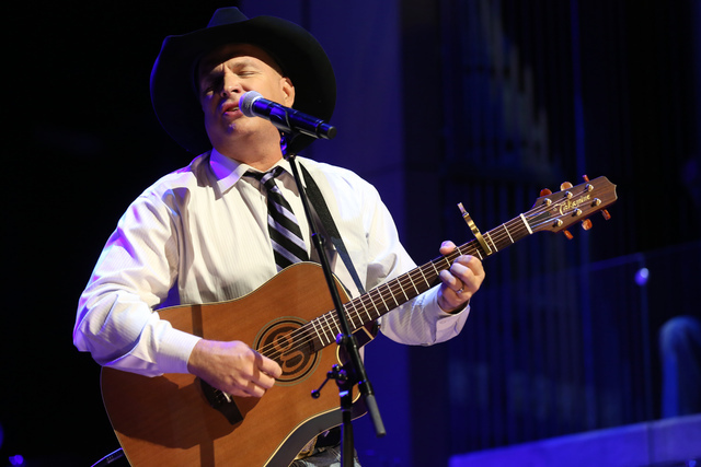 In this Oct. 25, 2015 file photo, Garth Brooks performs at The Country Music Hall of Fame 2015 Medallion Ceremony at Country Music Hall of Fame and Museum in Nashville, Tenn.  (Laura Roberts/Invis ...