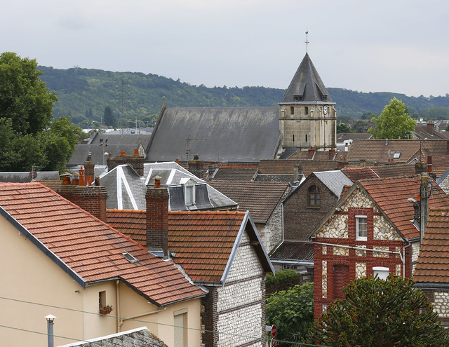 General view of the church where a priest was killed in an attack in Saint Etienne du Rouvray, Normandy, France, Tuesday, July 26, 2016. (Francois Mori/AP)