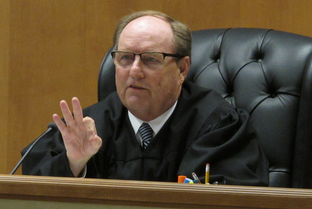 Shawnee County, Kan., District Judge Larry Hendricks makes a comment during a hearing on requiring the state to count potentially thousands of votes in state and local elections from people who've ...