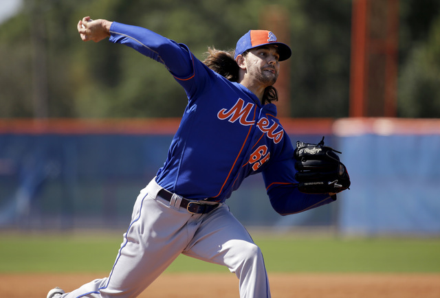 51s pitcher Robert Gsellman in a workout while attending the Mets spring training camp. He struggled in the 51s game Friday against the Iowa Cubs. (Jeff Roberson/Associated Press)