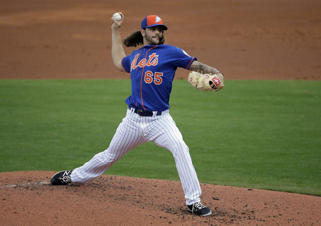 Robert Gsellman throws during a spring training game in this file photo. (Jeff Roberson/AP)