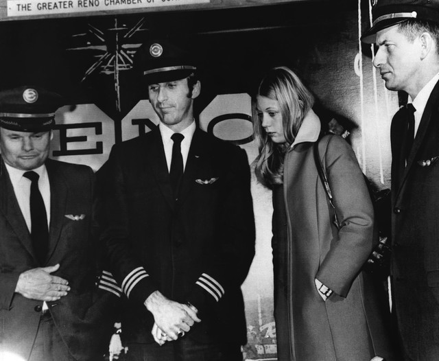 Crew members from a Northwest Airlines jet, hijacked Nov. 24, 1971, is seen in this Nov. 25, 1971, file photo as they appear at a news conference at the Reno International Airport, about two and a ...