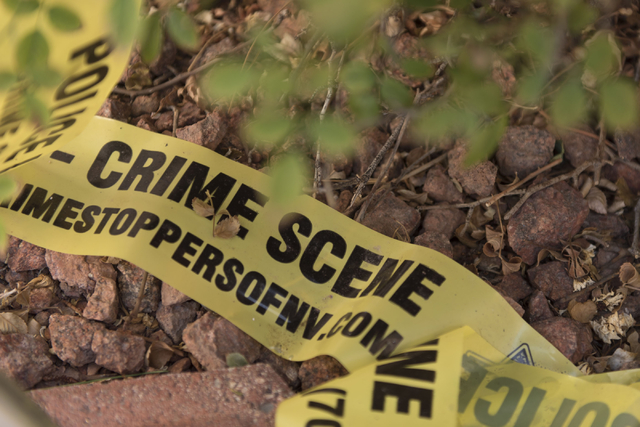 Crime scene tape is seen outside the home of Wednesday night's quadruple murder-suicide victims at Torrey Pines Condominiums in Las Vegas on Saturday, July 2, 2016. Jason Ogulnik/Las Vegas Review- ...