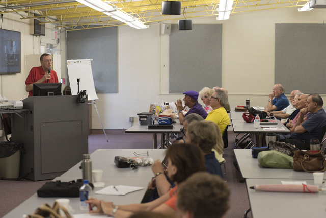 Howie Sussman, left, speaks to students during his Osher Lifelong Learning Institute class on Winston Churchill at UNLV's Educational Outreach Center in Las Vegas Wednesday, June 29, 2016. OLLI cl ...