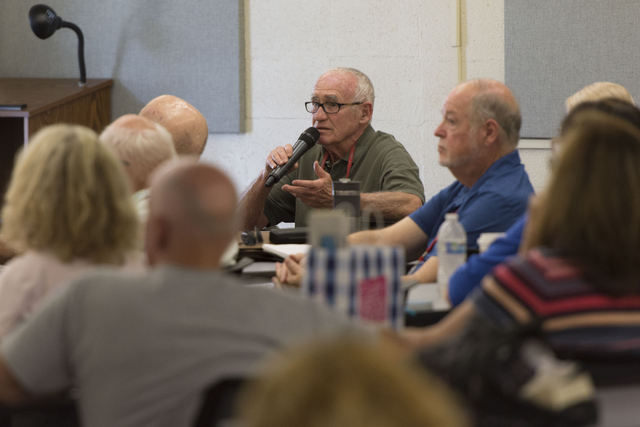 Robert Marcus, center, directs a question to instructor Howie Sussman after watching a documentary film during the Osher Lifelong Learning Institute class on Winston Churchill at UNLV's Educationa ...