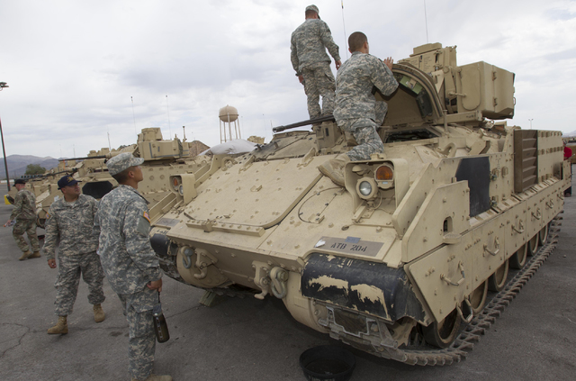 Nevada National Guard soldiers are seen on an A-3 Bradley fighting vehicle during a training exercise at the Clark County Armory on Friday, July 29, 2016. Richard Brian/Las Vegas Review-Journal Fo ...