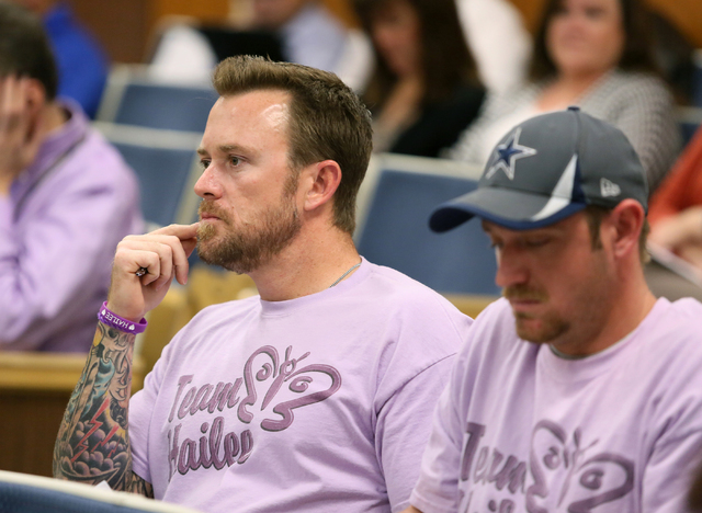 Jason Lamberth, left, sits with his brother Daniel Lincoln during a Clark County School Board meeting Wednesday, May 7, 2014, in Las Vegas. The brothers wore matching shirts in memory of Lamberth' ...