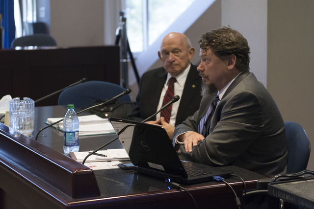 Clark County School District Superintendent Pat Skorkowsky, right, and education consultant Michael Strembitsky speak during a legislative committee meeting to discuss reorganization plans for the ...