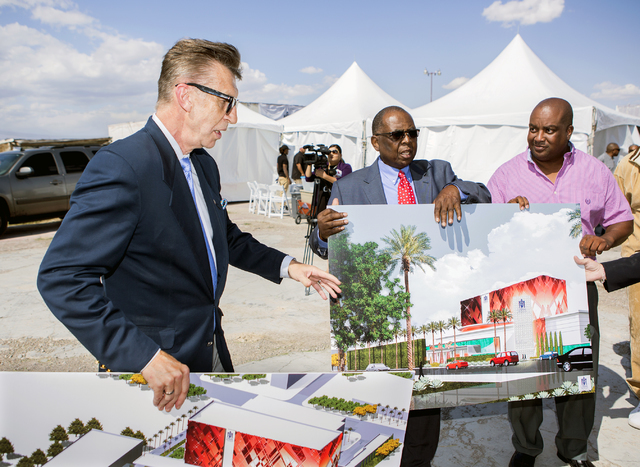 Architect Edward Vance, left, discusses the proposed new Moulin Rouge Las Vegas while Gene Collins, center, vice president of Moulin Rouge Holdings and Scott Johnson, president of Moulin Rouge Hol ...