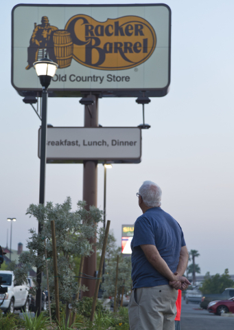 Harold Meteer looks up at the Vracker Barrel sign during the grand opening at Las Vegas' first location near the Silverton Hotel-Casino on Monday, July 25, 2016. The line to get in stretched into  ...