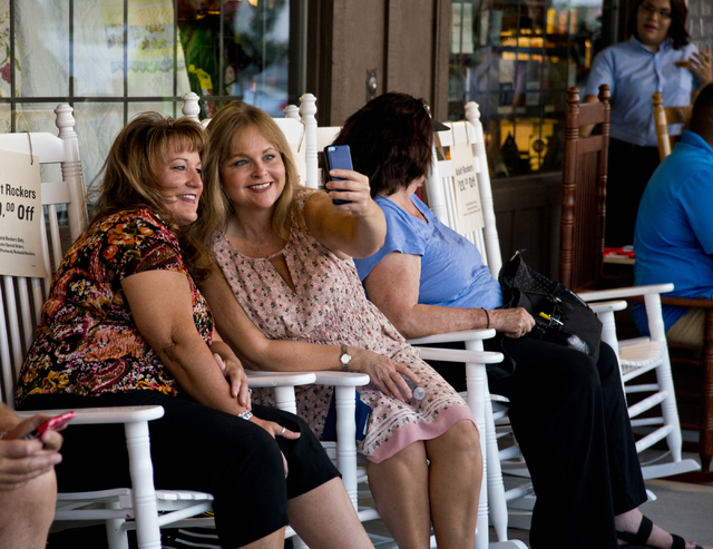 Jacquelynn Nickler, left, and Holly Crone take a selfie during the grand opening of Las Vegas' first Cracker Barrel location near the Silverton Hotel-Casino on Monday, July 25, 2016. The line to g ...