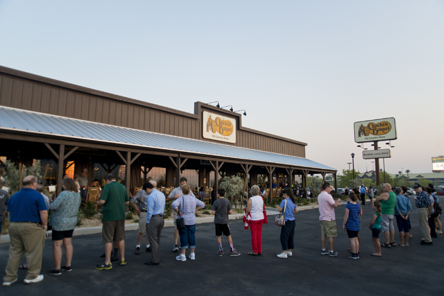 Customers line up during the grand opening of Las Vegas' first Cracker Barrel location near the Silverton Hotel-Casino on Monday, July 25, 2016. The line to get in stretched into the parking lot b ...