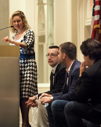 Moderator Shane Tews listens as panelists Michael Kaczmarek, Scott McCormick and Ian C. Ballon, left to right, discuss cyber security details with business owners at a breakfast meeting sponsored ...
