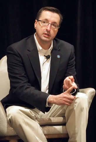 Panelist Michael Kaczmarek discusses cyber security details with business owners at a breakfast meeting sponsored by the Las Vegas Metro Chamber of Commerce in Las Vegas, Friday, July 29, 2016. J ...