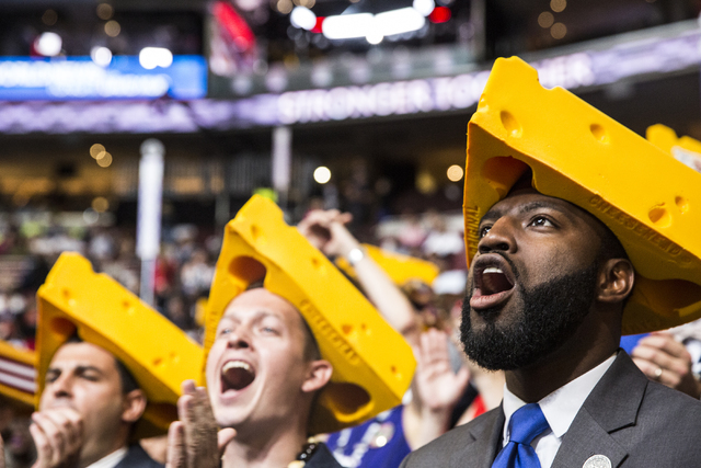 David Bowen, right, celebrates with fellow delegates from Wisconsin during the final day of the Democratic National Convention at the Wells Fargo Center on Thursday, July 28, 2016, in Philadelphia ...