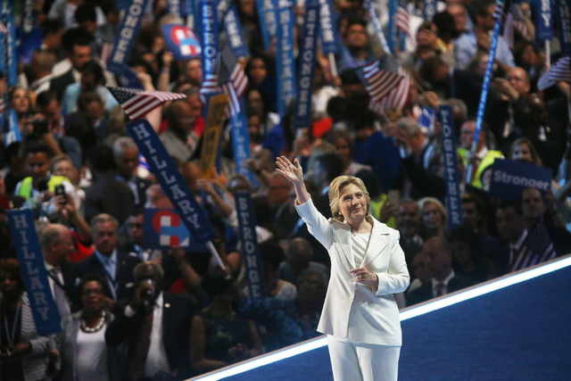 Democratic presidential nominee Hillary Clinton salutes the crowd during the final day of the Democratic National Convention at the Wells Fargo Center on Thursday, July 28, 2016, in Philadelphia.  ...