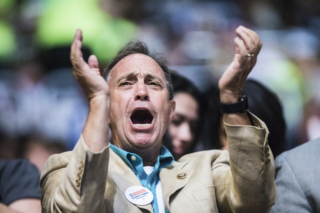 A Hillary Clinton supporter cheers during the Democratic presidential nominee's speech on the final day of the Democratic National Convention at the Wells Fargo Center on Thursday, July 28, 2016, ...