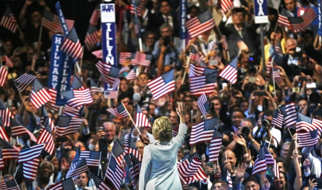 Democratic presidential nominee Hillary Clinton waives to  the crowd during the final day of the Democratic National Convention at the Wells Fargo Center on Thursday, July 28, 2016, in Philadelphi ...