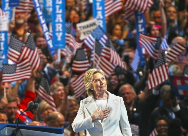 Democratic presidential nominee Hillary Clinton looks into the crowd before presenting her speech during the final day of the Democratic National Convention at the Wells Fargo Center on Thursday, ...