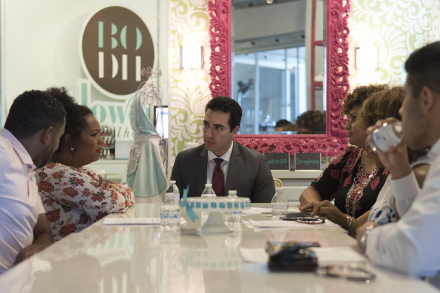 Democratic nominee for the 4th Congressional District Ruben Kihuen, center, speaks with local entrepreneurs at Blowout Dollhouse at Tivoli Village in Las Vegas Thursday, July 7, 2016. (Jason Oguln ...